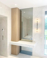 Modern Asymmetric Brass Wall Sconce with Cylindrical Glass Shades for Luxury Interiors