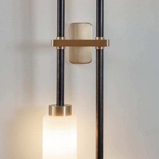 Modern Asymmetric Brass Wall Sconce with Cylindrical Glass Shades for Luxury Interiors