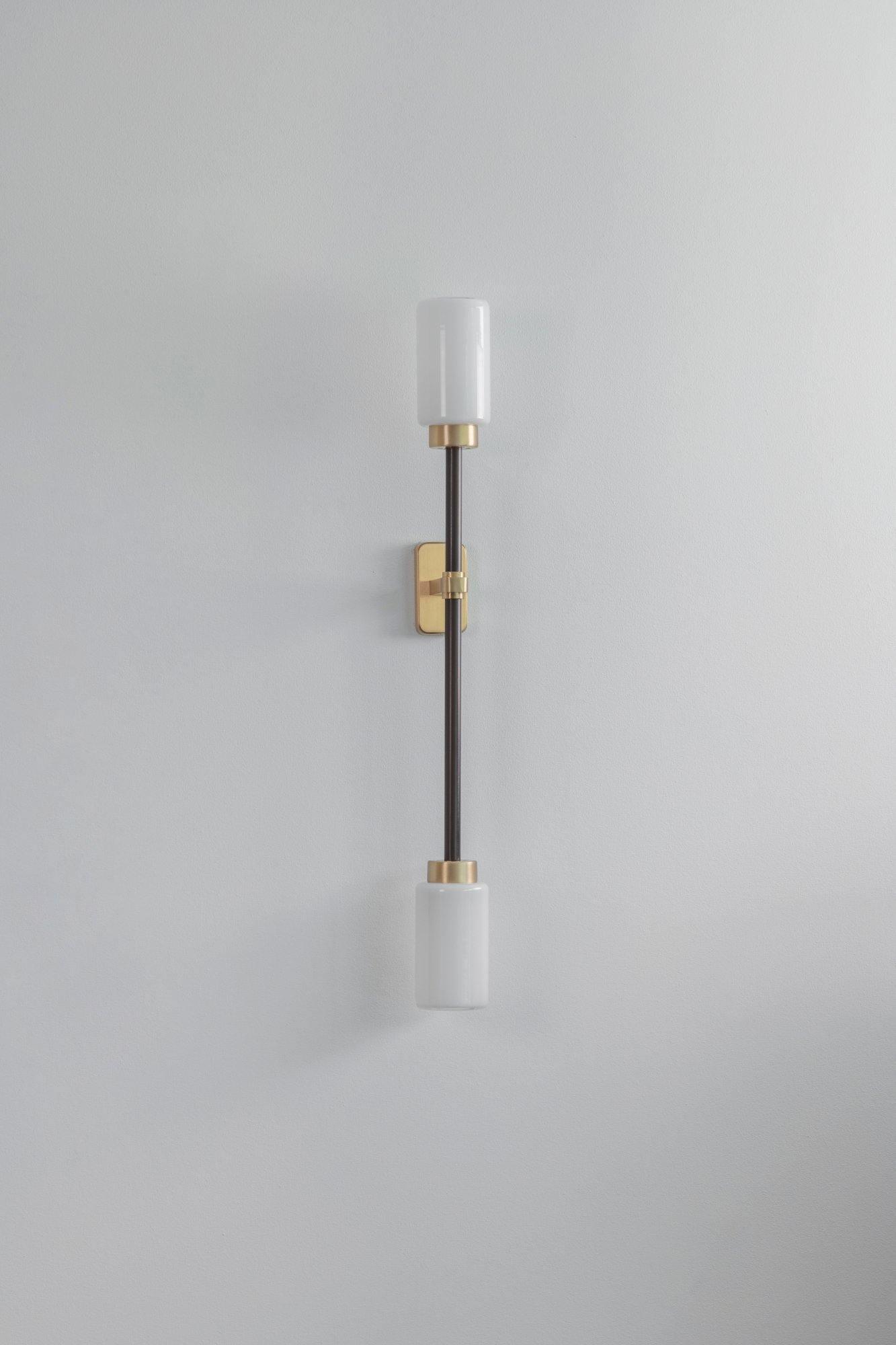 Modern Asymmetric Brass Wall Sconce with Cylindrical Glass Shades for Luxury Interiors