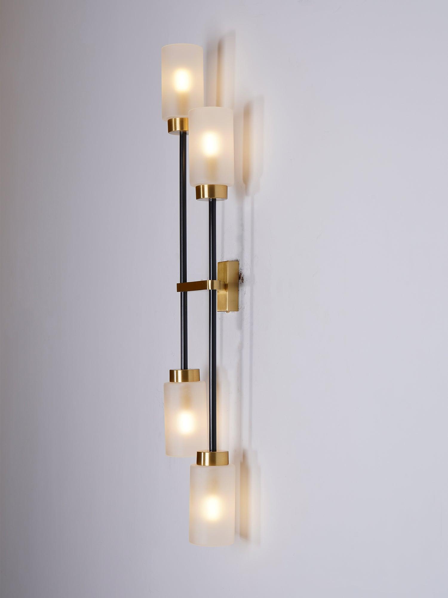 Modern Asymmetric Brass Wall Sconce with Cylindrical Glass Shades for Luxury Interiors