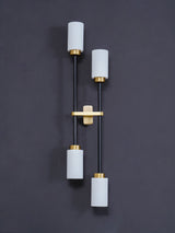 Modern Asymmetric Brass Wall Sconce with Cylindrical Glass Shades for Luxury Interiors