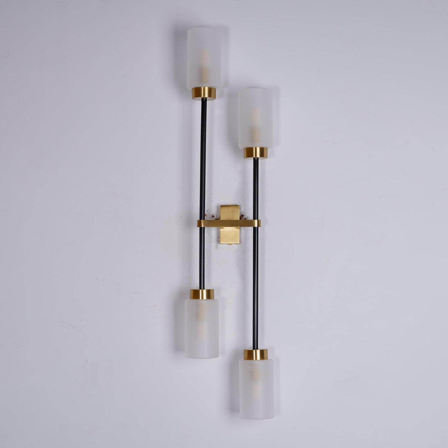 Modern Asymmetric Brass Wall Sconce with Cylindrical Glass Shades for Luxury Interiors