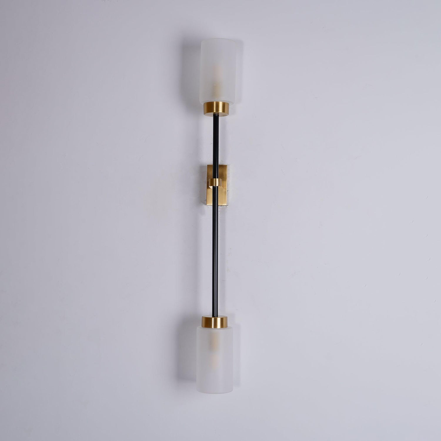 Modern Asymmetric Brass Wall Sconce with Cylindrical Glass Shades for Luxury Interiors