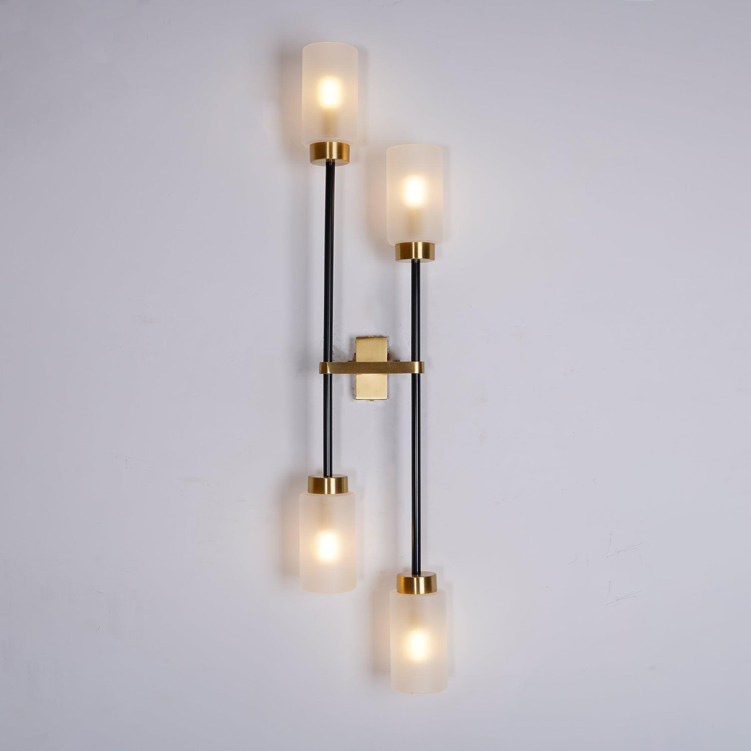 Modern Asymmetric Brass Wall Sconce with Cylindrical Glass Shades for Luxury Interiors