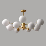 modern-asymmetrical-brass-chandelier-with-opal-glass-globe-shades-for-living-and-dining-rooms