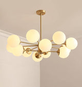 modern-asymmetrical-brass-chandelier-with-opal-glass-globe-shades-for-living-and-dining-rooms