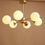 modern-asymmetrical-brass-chandelier-with-opal-glass-globe-shades-for-living-and-dining-rooms