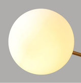 modern-asymmetrical-brass-chandelier-with-opal-glass-globe-shades-for-living-and-dining-rooms