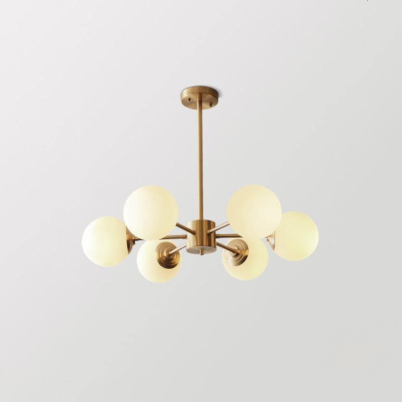 modern-asymmetrical-brass-chandelier-with-opal-glass-globe-shades-for-living-and-dining-rooms