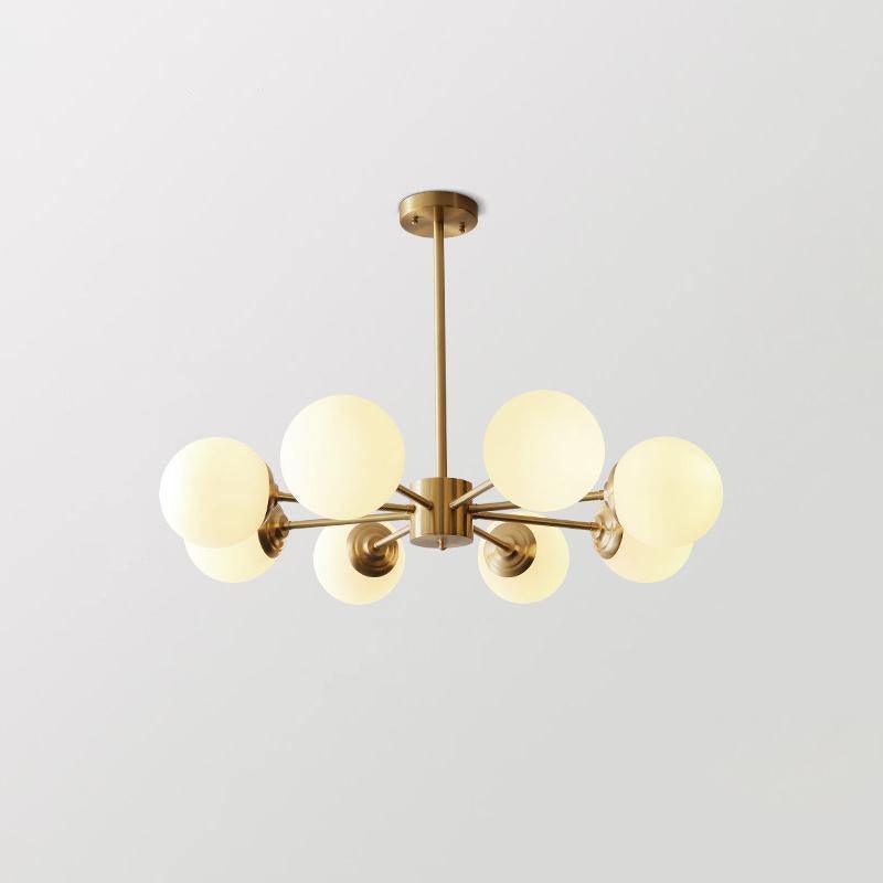 modern-asymmetrical-brass-chandelier-with-opal-glass-globe-shades-for-living-and-dining-rooms
