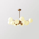 modern-asymmetrical-brass-chandelier-with-opal-glass-globe-shades-for-living-and-dining-rooms