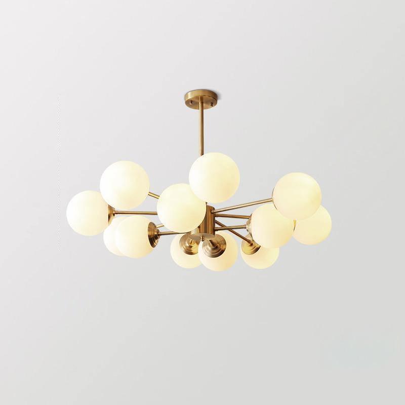 modern-asymmetrical-brass-chandelier-with-opal-glass-globe-shades-for-living-and-dining-rooms
