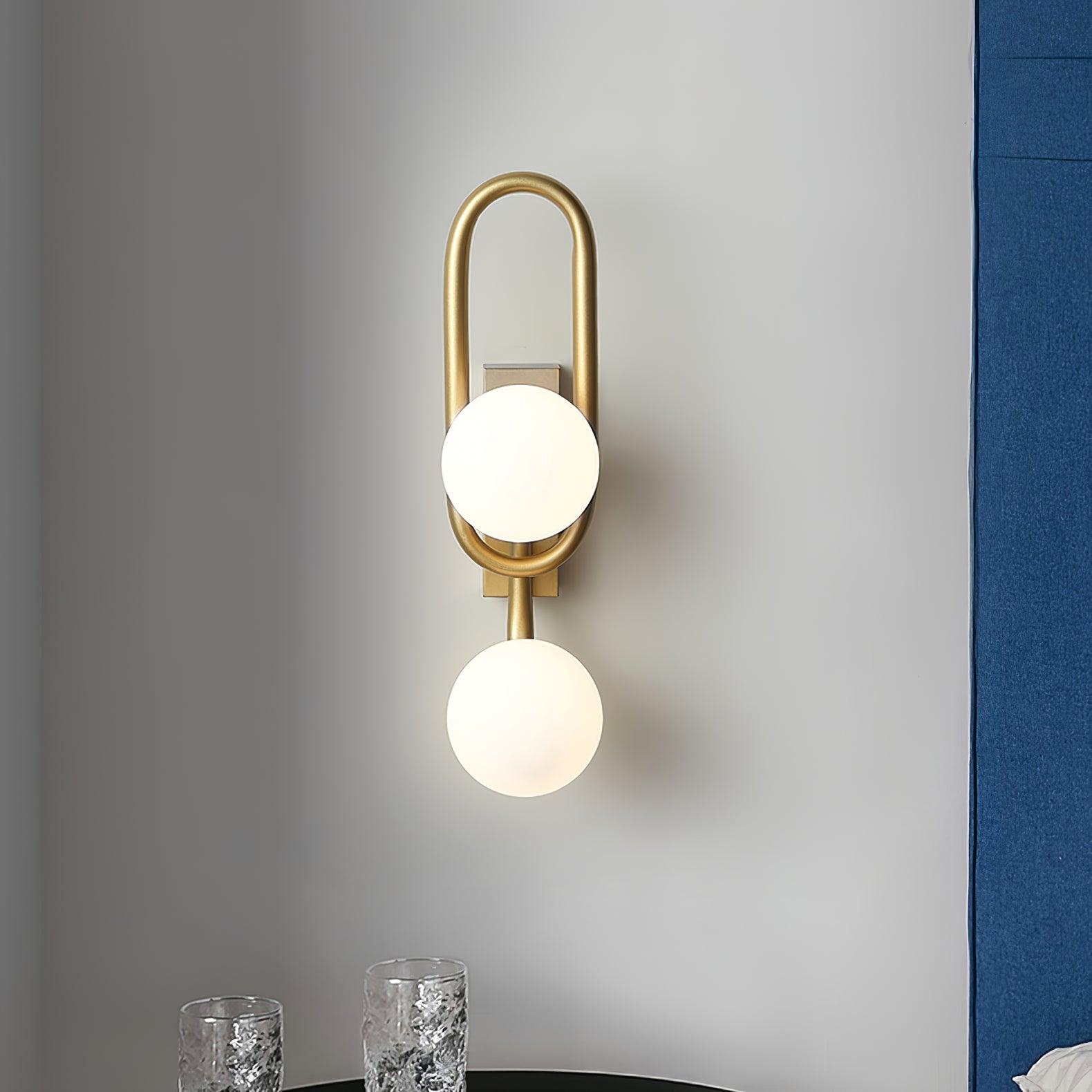 Modern Belisto Gold Wall Lamp with Oval Metal Frame and White Glass Globe Shade