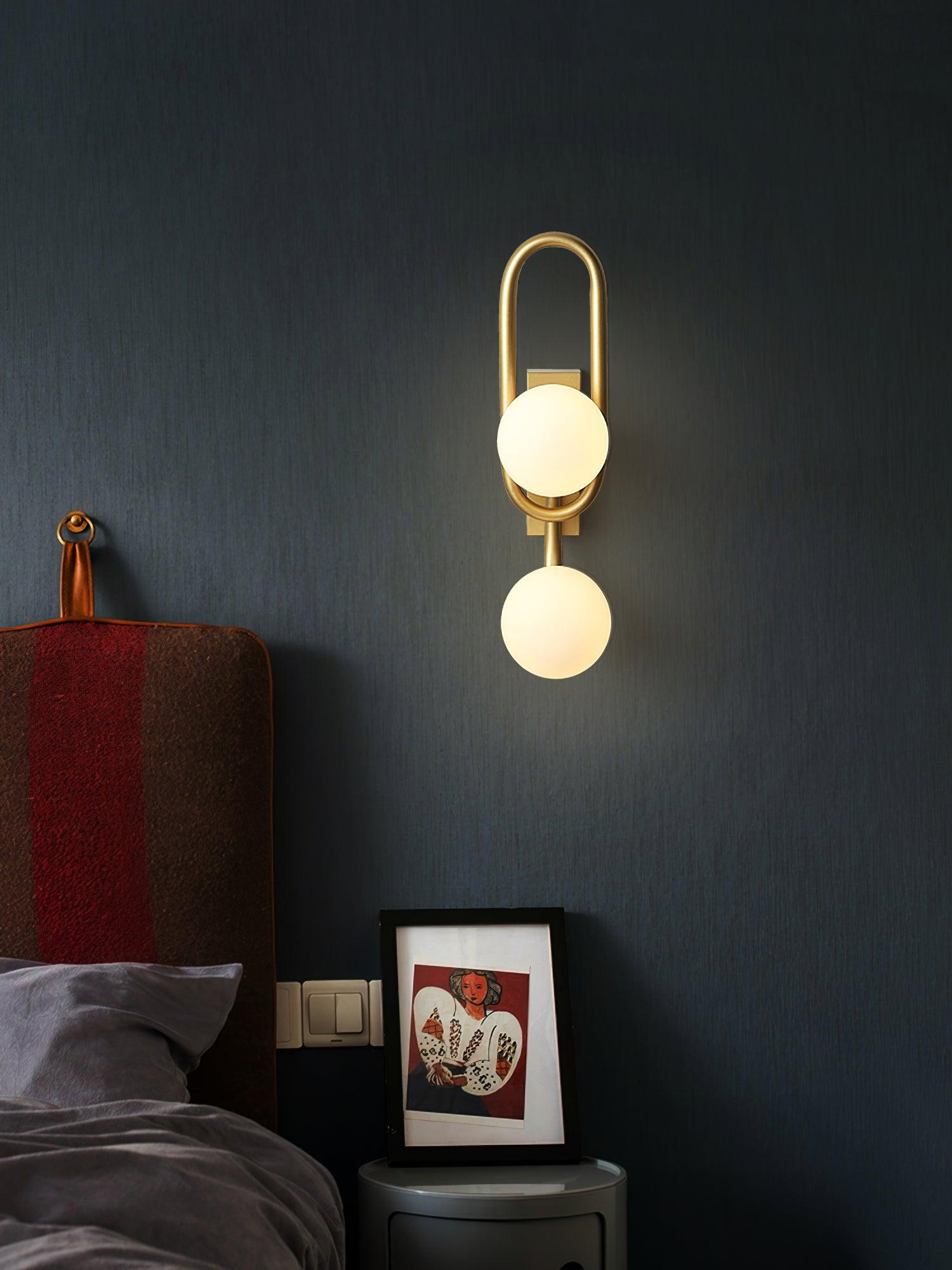 Modern Belisto Gold Wall Lamp with Oval Metal Frame and White Glass Globe Shade