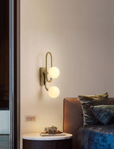 Modern Belisto Gold Wall Lamp with Oval Metal Frame and White Glass Globe Shade
