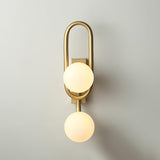 Modern Belisto Gold Wall Lamp with Oval Metal Frame and White Glass Globe Shade