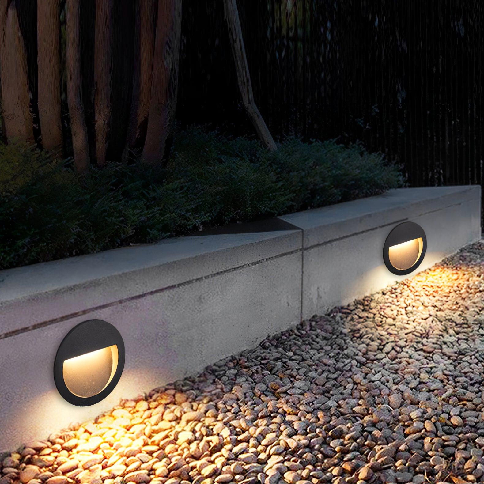 Modern Black Circular LED Outdoor Step Light and Exterior Wall Sconce for Patios and Stairways