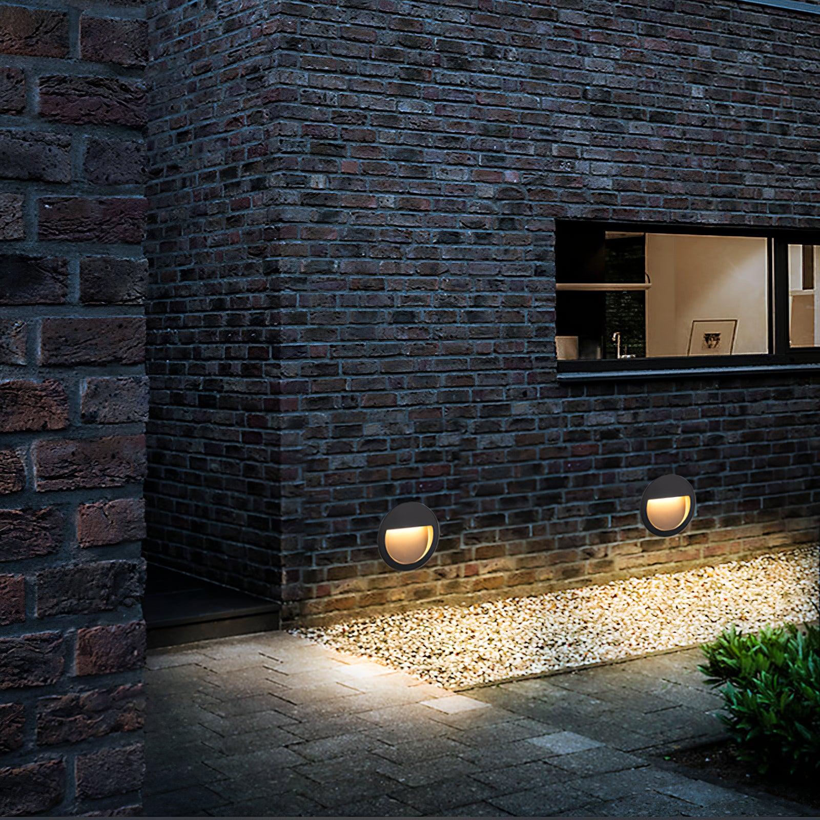 Modern Black Circular LED Outdoor Step Light and Exterior Wall Sconce for Patios and Stairways