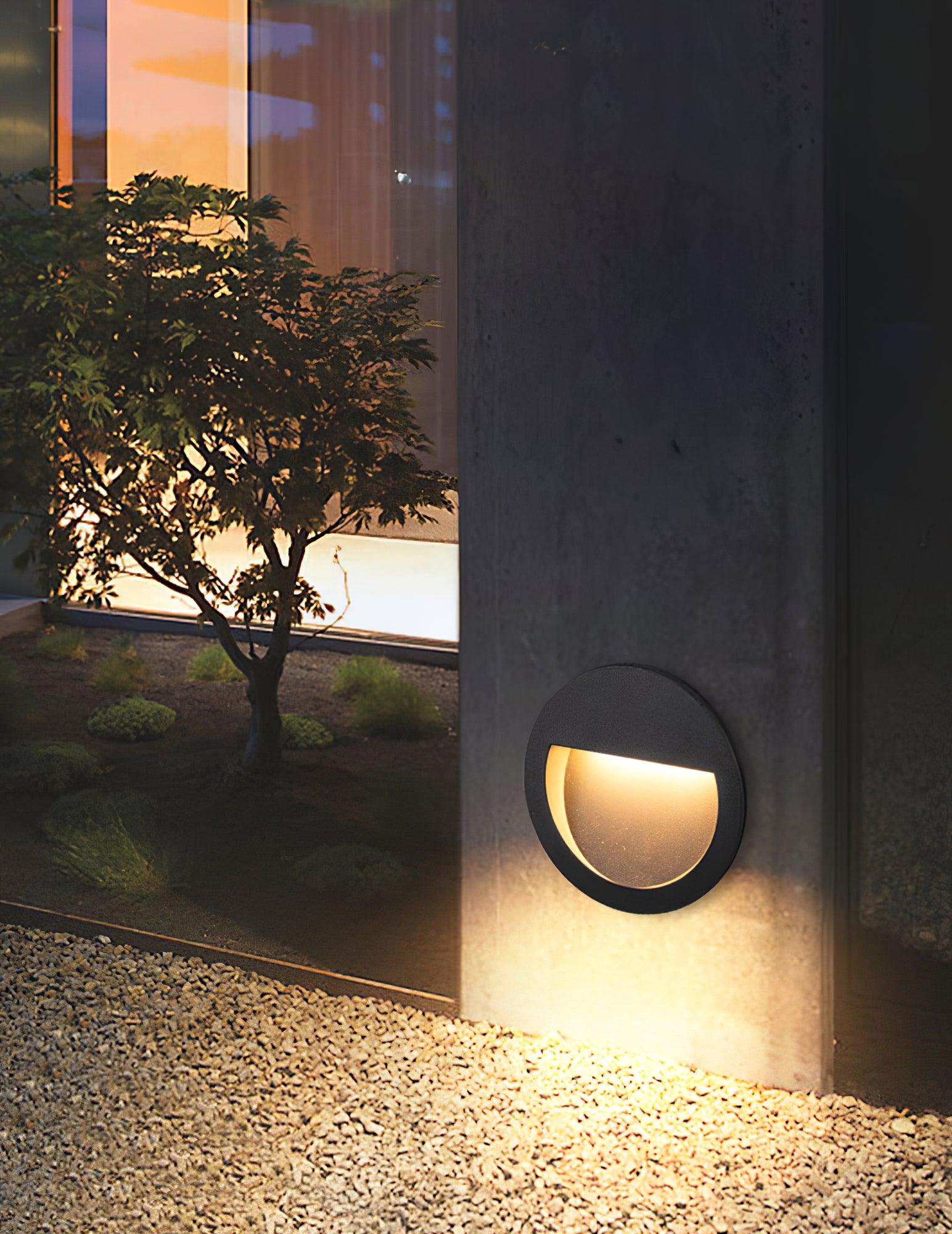 Modern Black Circular LED Outdoor Step Light and Exterior Wall Sconce for Patios and Stairways