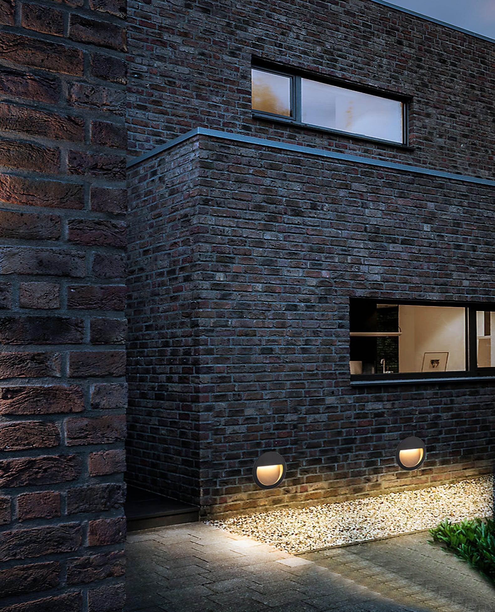 Modern Black Circular LED Outdoor Step Light and Exterior Wall Sconce for Patios and Stairways