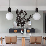 Modern Blown Glass Pendant Light with Minimalist Metal Frame for Contemporary Indoor Spaces