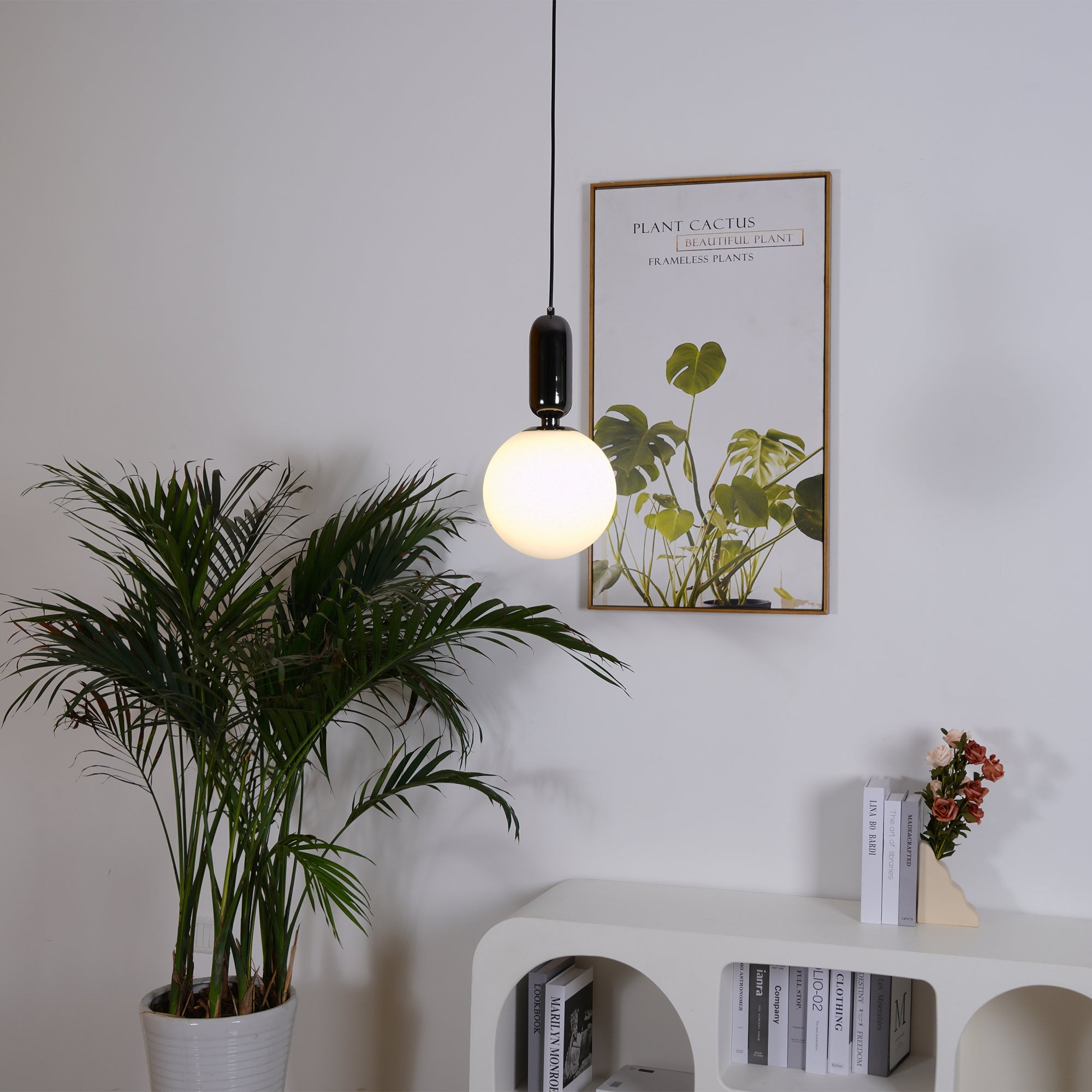 Modern Blown Glass Pendant Light with Minimalist Metal Frame for Contemporary Indoor Spaces