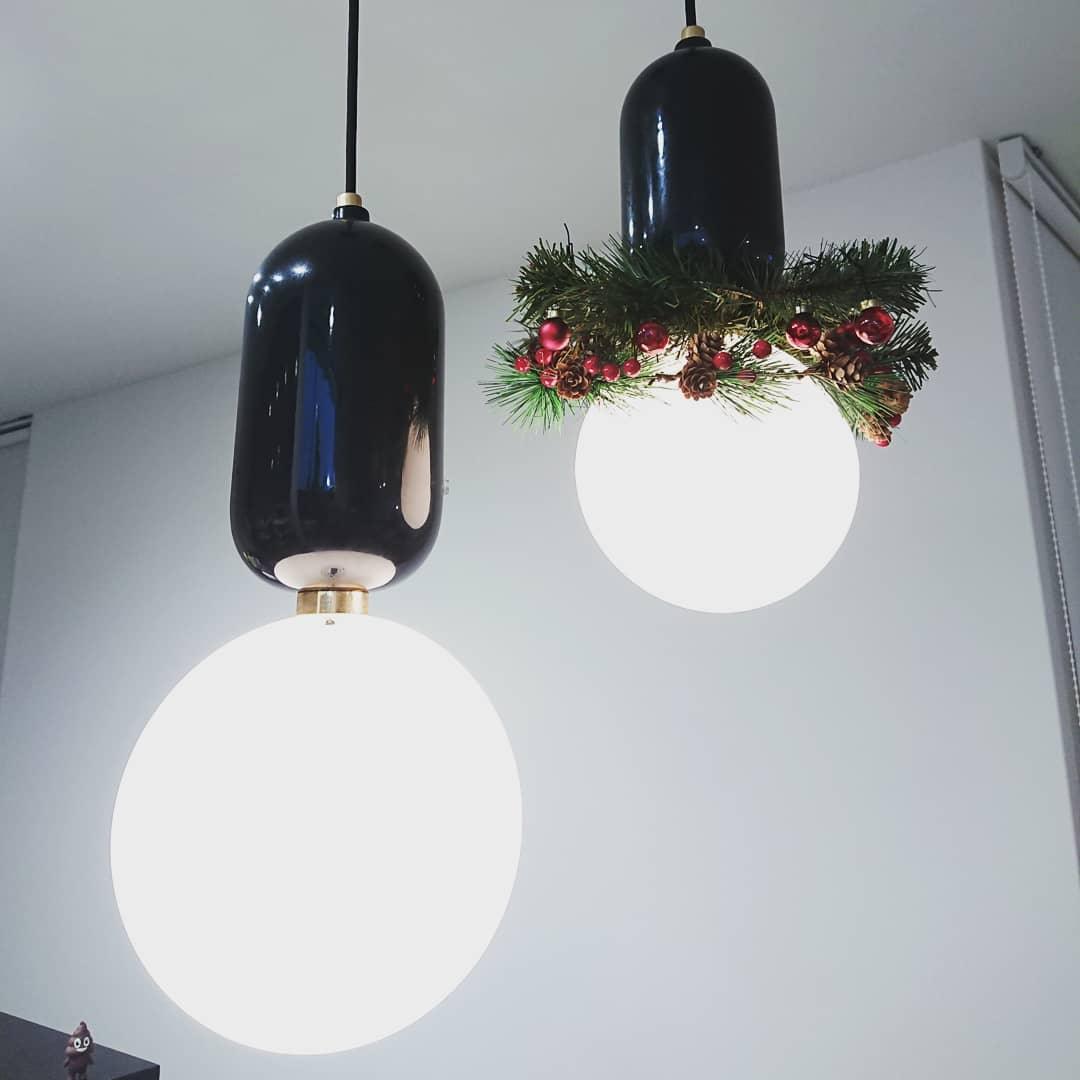 Modern Blown Glass Pendant Light with Minimalist Metal Frame for Contemporary Indoor Spaces