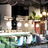 Modern Blown Glass Pendant Light with Minimalist Metal Frame for Contemporary Indoor Spaces