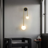 Modern Brass Curved Wall Sconce with Dual White Glass Globes for Living Room and Bedroom