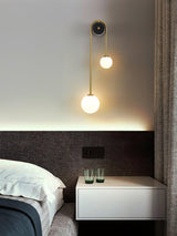 Modern Brass Curved Wall Sconce with Dual White Glass Globes for Living Room and Bedroom