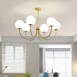 Modern Brass Globe Crown Chandelier with Elegant Curved Arms and Glass Ball Shades