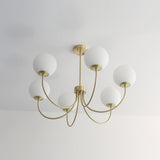 Modern Brass Globe Crown Chandelier with Elegant Curved Arms and Glass Ball Shades