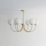 Modern Brass Globe Crown Chandelier with Elegant Curved Arms and Glass Ball Shades