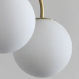 Modern Brass Globe Crown Chandelier with Elegant Curved Arms and Glass Ball Shades