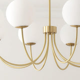 Modern Brass Globe Crown Chandelier with Elegant Curved Arms and Glass Ball Shades