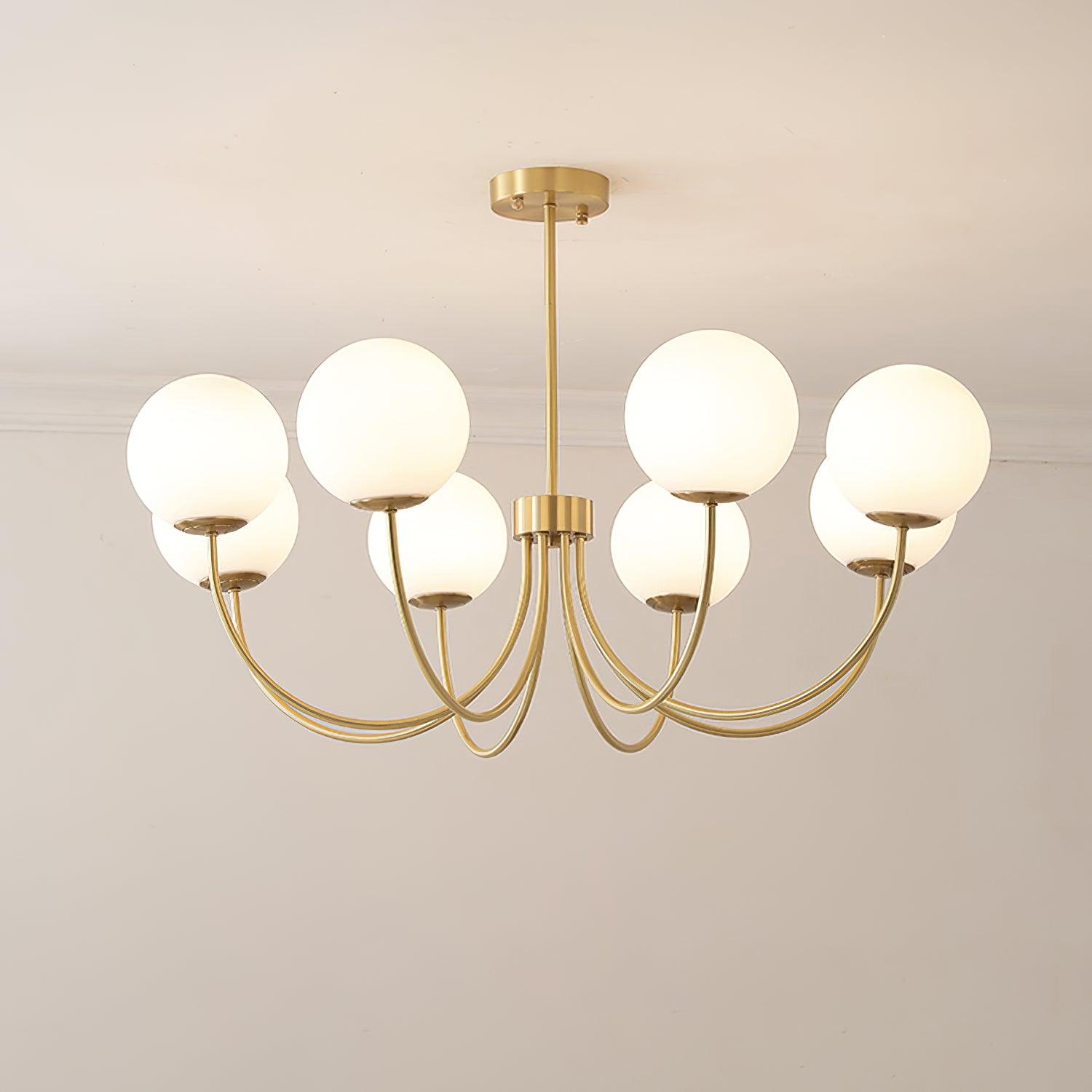 Modern Brass Globe Crown Chandelier with Elegant Curved Arms and Glass Ball Shades