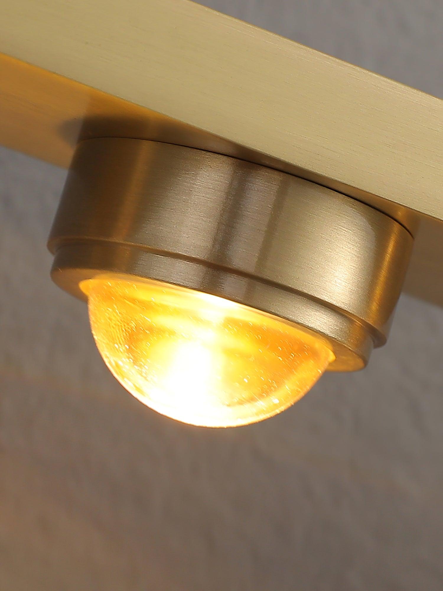 Modern Brass LED Wall Lamp with Glass Shade and Integrated Halo Light Effect