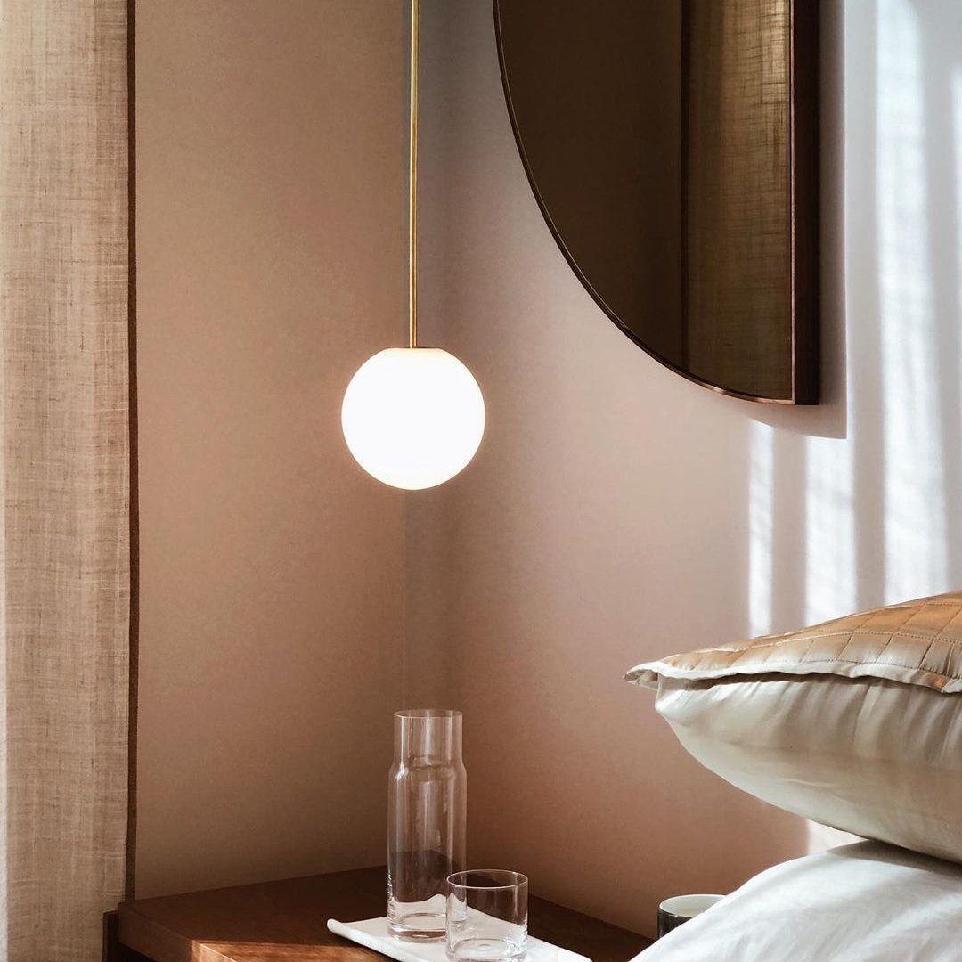 Modern Brass Rod Pendant Light with Spherical Mouth Blown Opal Glass Globe