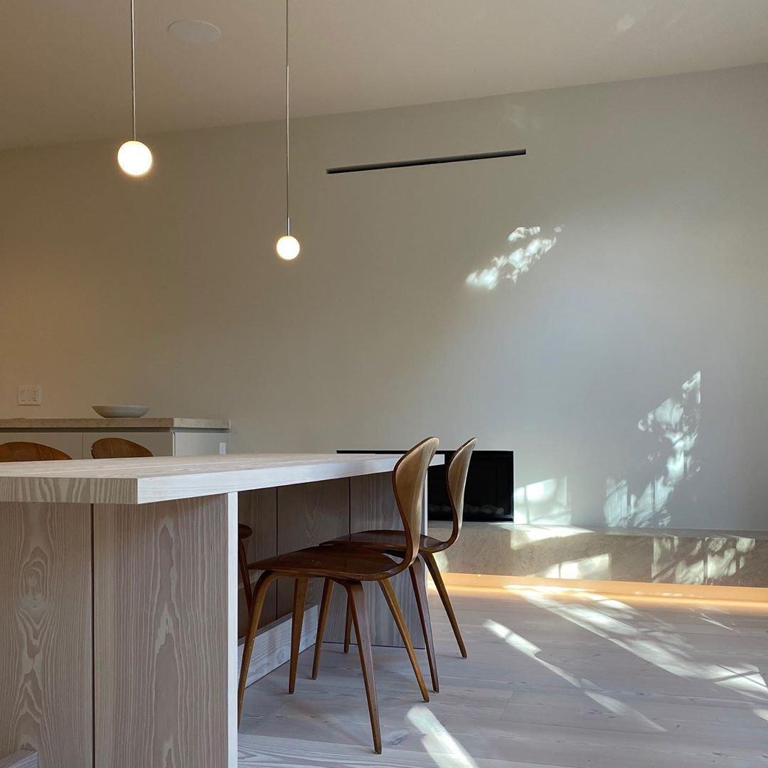 Modern Brass Rod Pendant Light with Spherical Mouth Blown Opal Glass Globe