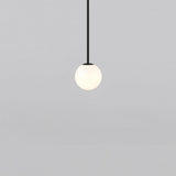 Modern Brass Rod Pendant Light with Spherical Mouth Blown Opal Glass Globe