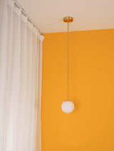 Modern Brass Rod Pendant Light with Spherical Mouth Blown Opal Glass Globe