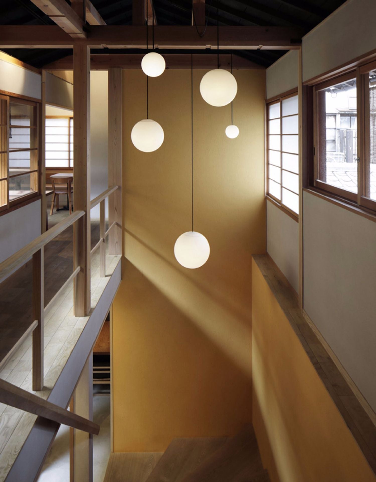 Modern Brass Rod Pendant Light with Spherical Mouth Blown Opal Glass Globe