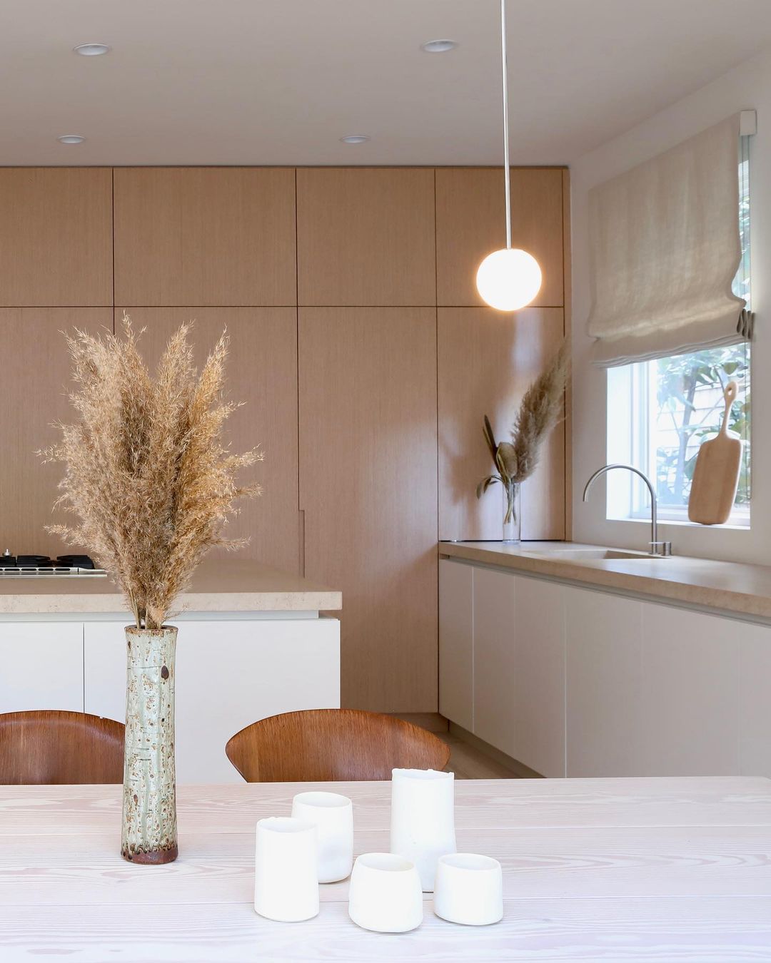 Modern Brass Rod Pendant Light with Spherical Mouth Blown Opal Glass Globe