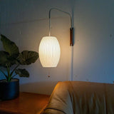 Modern Bubble Ball Wall Sconce with Walnut Accents and Adjustable Swivel Arm