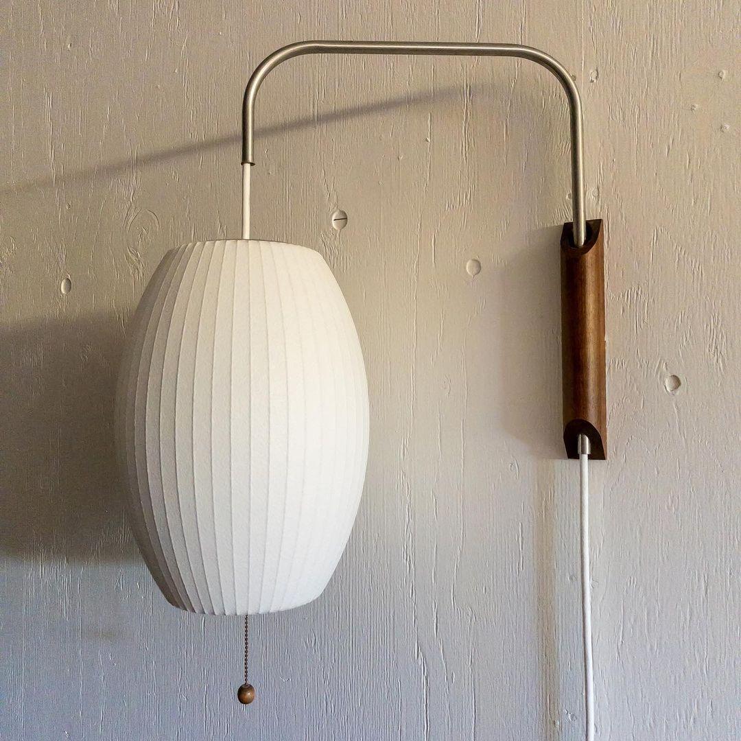 Modern Bubble Ball Wall Sconce with Walnut Accents and Adjustable Swivel Arm