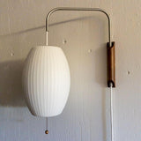 Modern Bubble Ball Wall Sconce with Walnut Accents and Adjustable Swivel Arm