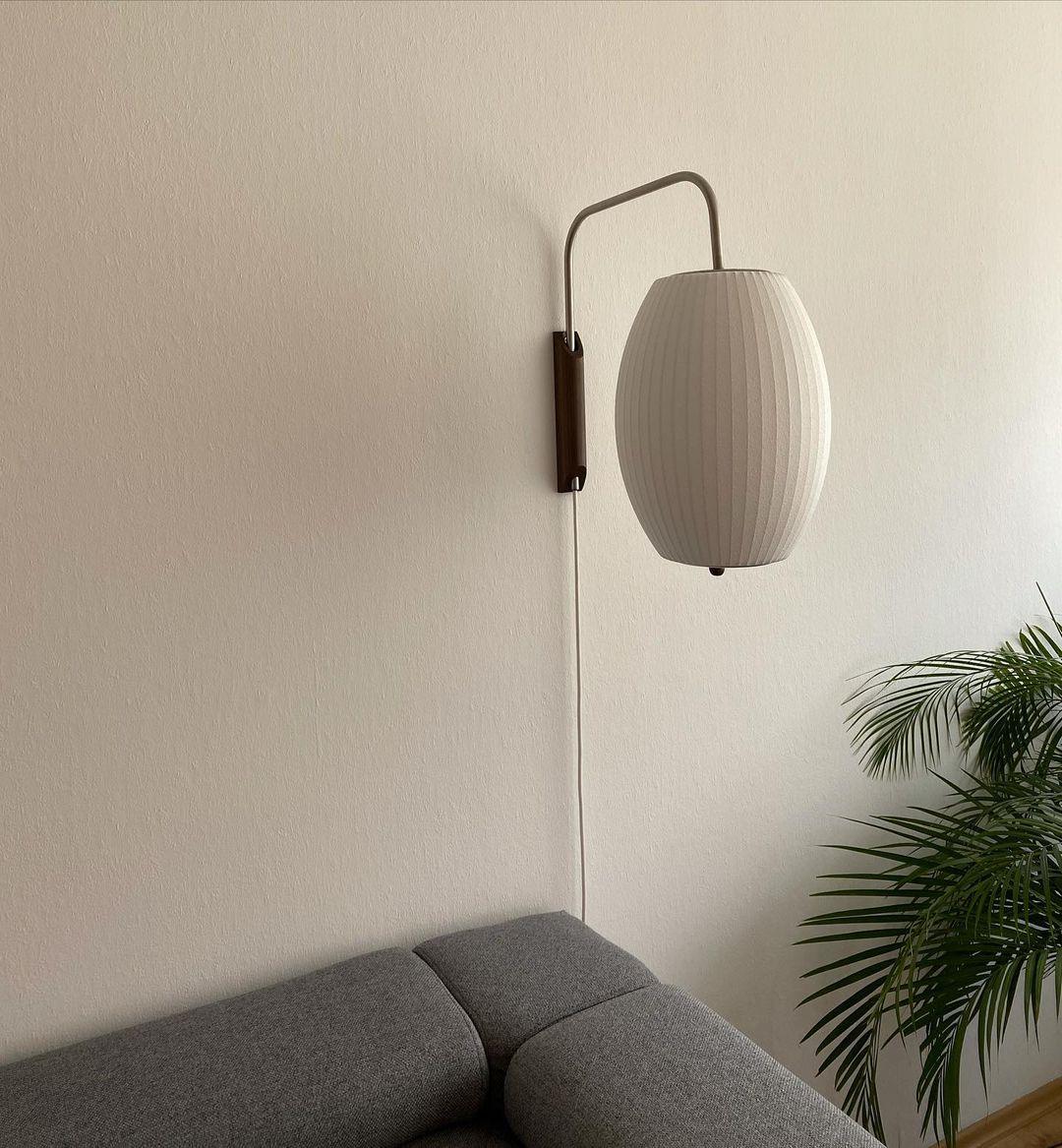 Modern Bubble Ball Wall Sconce with Walnut Accents and Adjustable Swivel Arm