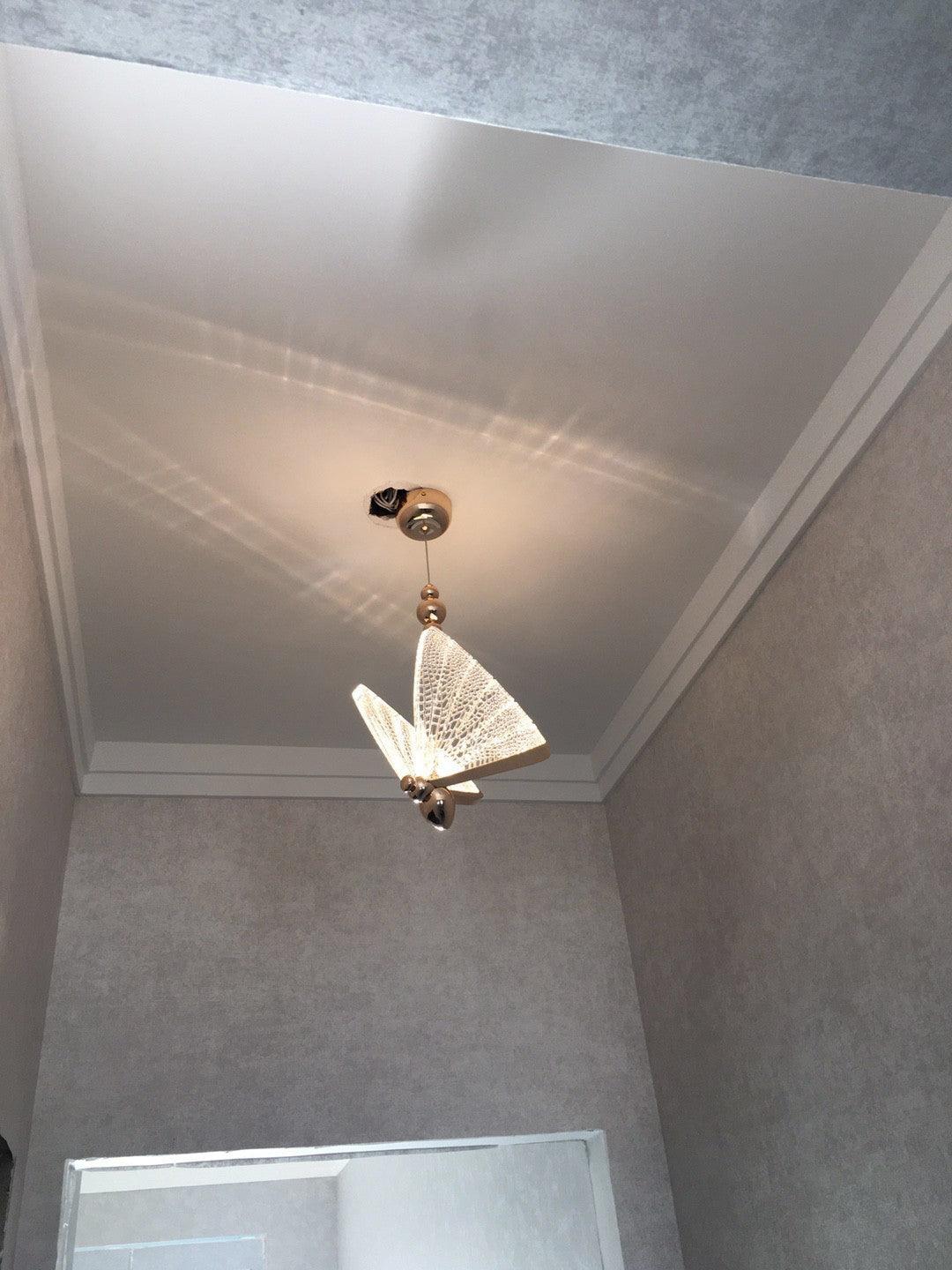 Modern Butterfly LED Pendant Light with Transparent Acrylic Wings and Adjustable Hanging Height