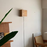 Modern Cherry Wood Cube Wall Sconce with Round Grid Pattern Ambient LED Lighting