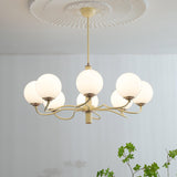 Modern Creamy Yellow Globe Glass Chandelier with White Spherical Shades